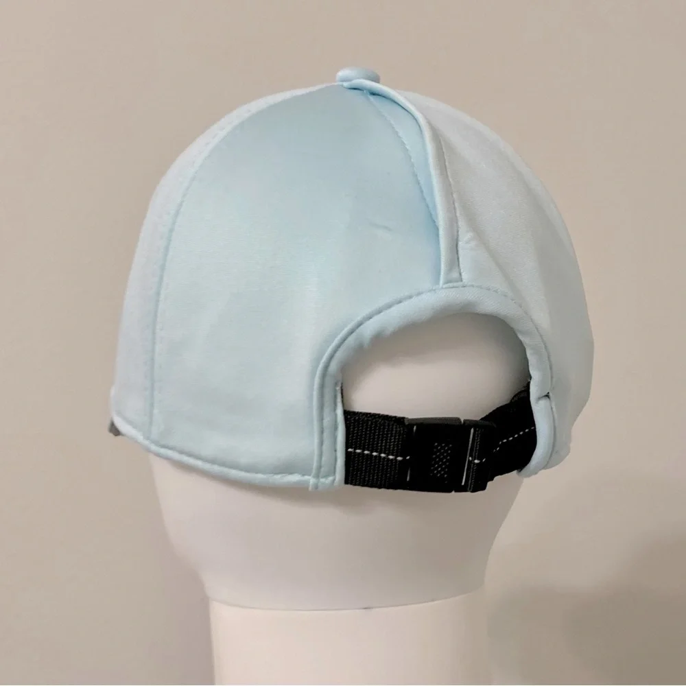 light blue baseball cap with reflective stripe on the peak self-adjusting .